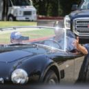 Mila Kunis &#8211; Out in Los Angeles riding his classic ford convertible