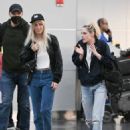 Kristen Stewart – With Dylan Meyer at JFK Airport in New York