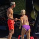 Caroline Stanbury – Seen In a purple bikini with her husband Sergio Carrallo at Mykonos - 454 x 681
