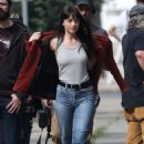 Dakota Johnson – Dons red leather jacket on the set of ‘Madame Web’ in Chelsea
