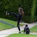 Troian Bellisario – Out for a walk with her dog in Los Angeles - 454 x 428