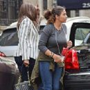 David Bowie's teenage daughter Lexi seen for first time since singer's tragic death as she steps out with model mom Iman in New York City