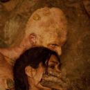 The mutant Chameleon (Derek Mears) quiets Missy (Daniella Alonso) - 454 x 681