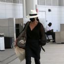 Catherine Zeta-Jones &#8211; Flight out of New Orleans