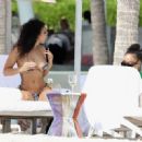 Draya Michele – In bikini on the beach in Cancun - 454 x 329