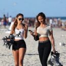 Catherine Paiz spotted getting ready to roller blade with a friend in Miami, Florida February 17,2014