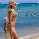 Sylvie Meis – Bikini candids at the beach in Saint Tropez - 454 x 681