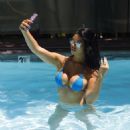 Suelyn Medeiros in Blue Bikini at luxury hotel in Los Angeles - 454 x 507