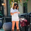 Emily Ratajkowski – In boots and shorts while out in New York