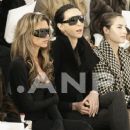Victoria Beckham and L'Wren Scott attend the Chanel fashion show during Paris Fashion Week (Haute Couture) Spring/Summer 2006 on January 24, 2006 in Paris, France - 372 x 500
