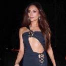 Shay Mitchell – In a revealing black dress for another Oscar party in Los Angeles