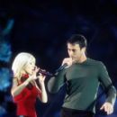 Christina Aguilera and Enrique Iglesias perform during the halftime show at Super Bowl XXXIV (2000) - 403 x 612