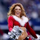 Dallas Cowboys Cheerleaders in Santa Suits – Performing an NFL football game in Arlington - 454 x 587