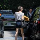 Milla Jovovich – Arrives at the Four Seasons in Los Angeles - 454 x 521