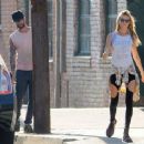 Adam Levine and his model wife Behati Prinsloo on the set of a Maroon 5 music video in Los Angeles, California on August 30, 2014