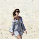 Cindy Crawford: headed out for a walk on the beach in Cabo San Lucas