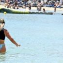 Katya Jones – With Amie Fuller are seen on the beach in Mykonos