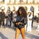Tina Kunakey – Photoshoot in Place Vendôme during Paris Fashion Week - 454 x 681