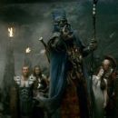(L-r) SAM WORTHINGTON as Perseus, HANS MATHESON as Ixas, IAN WHYTE as Sheikh Suleiman, GEMMA ARTERTON as Io and LIAM CUNNINGHAM as Solon in Warner Bros. Pictures’ and Legendary Pictures’ “The Clash of the Titans,” distributed by Wa - 454 x 187