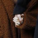 Megan Fox &#8211; Flashes her $340,000 engagement ring while leaving their Milan hotel