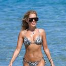 Sylvie Meis – Bikini candids at the beach in Saint Tropez - 454 x 681