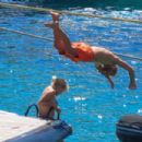 Caroline Stanbury – Seen In a purple bikini with her husband Sergio Carrallo at Mykonos - 454 x 302
