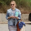 Kate Hudson wore a denim jacket and brown suede boots out and about in LA