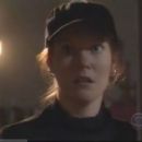 Darby Stanchfield- as Nora
