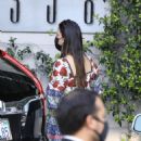 Olivia Munn – Steps out in a colorful dress at Sunset Tower in West Hollywood