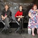 Lily Collins and Jamie Campbell Bower at a Q&A and book signing to promote 