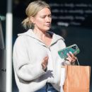 Hilary Duff – Seen in a red Adidas sneakers while out in Los Angeles