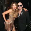 Sofia Vergara and Pitbull - The 58th GRAMMY Awards - Backstage And Audience - 454 x 566