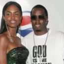 Puff Daddy and Kim Porter