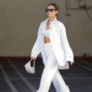 Shay Mitchell – in crop top and white denim out in Los Angeles