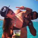 Retired footballer Ronaldo uses a selfie stick to take loved up holiday snaps in the sea with beach babe fiancé Paula Morais - 454 x 450