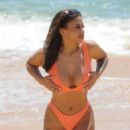 Kayleigh Morris – In orange bikini on the beach in Cyprus - 454 x 634