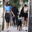 Hailey Bieber and Kendall Jenner – Out for a walk with Kendall doberman in West Hollywood