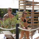 Gabby Allen – In a black bikini by the pool at Nobu Hotel in Ibiza - 454 x 552