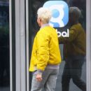 Dame Kelly Holmes – Wearing yellow bomber jacket and blond hair in London - 454 x 674