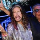 Steven Tyler and Roberto Cavalli attend the Roberto Cavalli show during the Milan Menswear Fashion Week Spring Summer 2015 on June 24, 2014 in Milan, Italy - 454 x 303