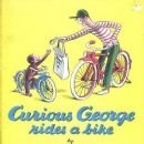 Curious George Rides a Bike