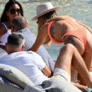 Laura Anderson – Seen in a coral swimsuit in Mykonos - 454 x 318