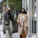 Camila Mendes – With Lili Reinhart steps out for dog walk in Vancouver Canada