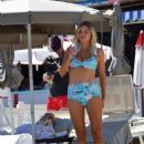 Sophie Monk in Blue Bikini on a beach in Portofino