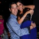 Sofia Vergara sits on fiance Nick Loeb's lap during New Year's Eve celebrations at Miami's Delano on Dec. 31, 2012 - 399 x 600
