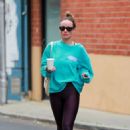 Olivia Wilde – Dons purple leggings ahead of a workout in Los Angeles