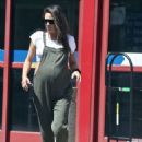 Shay Mitchell – Shows off her baby bump at Best Buy in LA