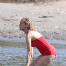 Diane Kruger – In a red bathing suit on the set of ‘Out of the Blue’ in Warwick