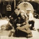 Charlie Chaplin, Edna Purviance and Charlie's brother Sydney on the set of The Immigrant (1917) - 454 x 362