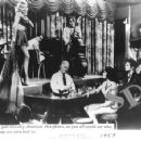 Gloria Pall struts her stuff on stage (with D.J. Fontana, Mike Stoller and Bill Black in back) during the Florita Nightclub scene watched by Elvis and Judy Tyler - 435 x 356